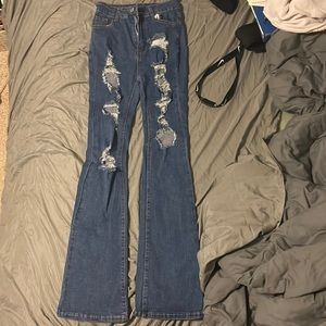 dark blue flare ripped jeans